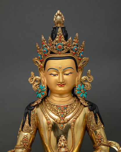Amitayus statue close up view, gold gilded copper details Himalayan craftsmanship Nepal
