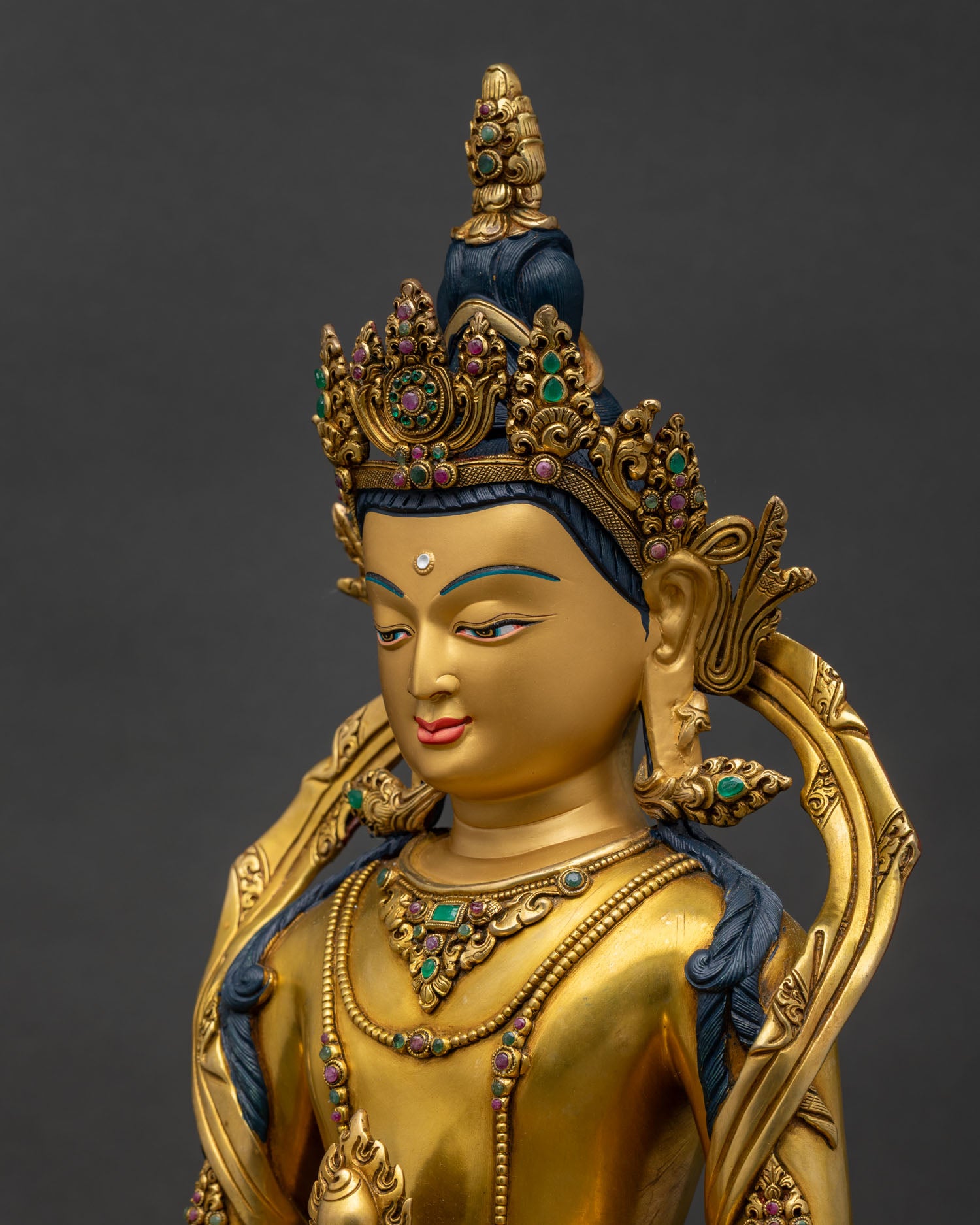 Amitayus Statue detailed close up face gold-painted face with intricate Buddhist details