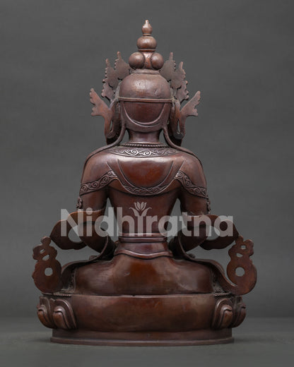 Amitayus statue detailed view showing sacred vase lotus throne and traditional Buddhist artistry.