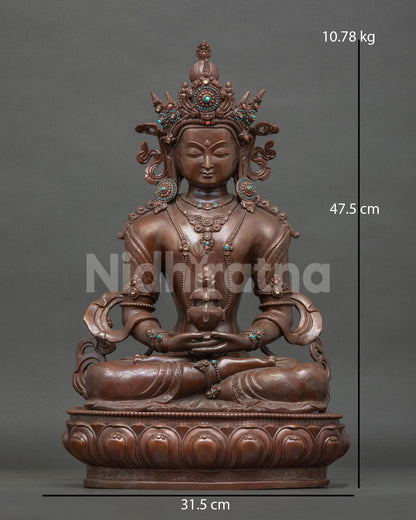 Amitayus statue handcrafted by newari artist from patan nepal with oxidized copper finish.