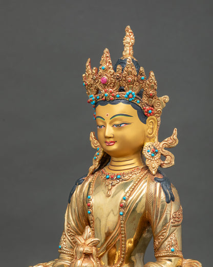 Amitayus statue holding Kalasha vase of immortality gold gilded.