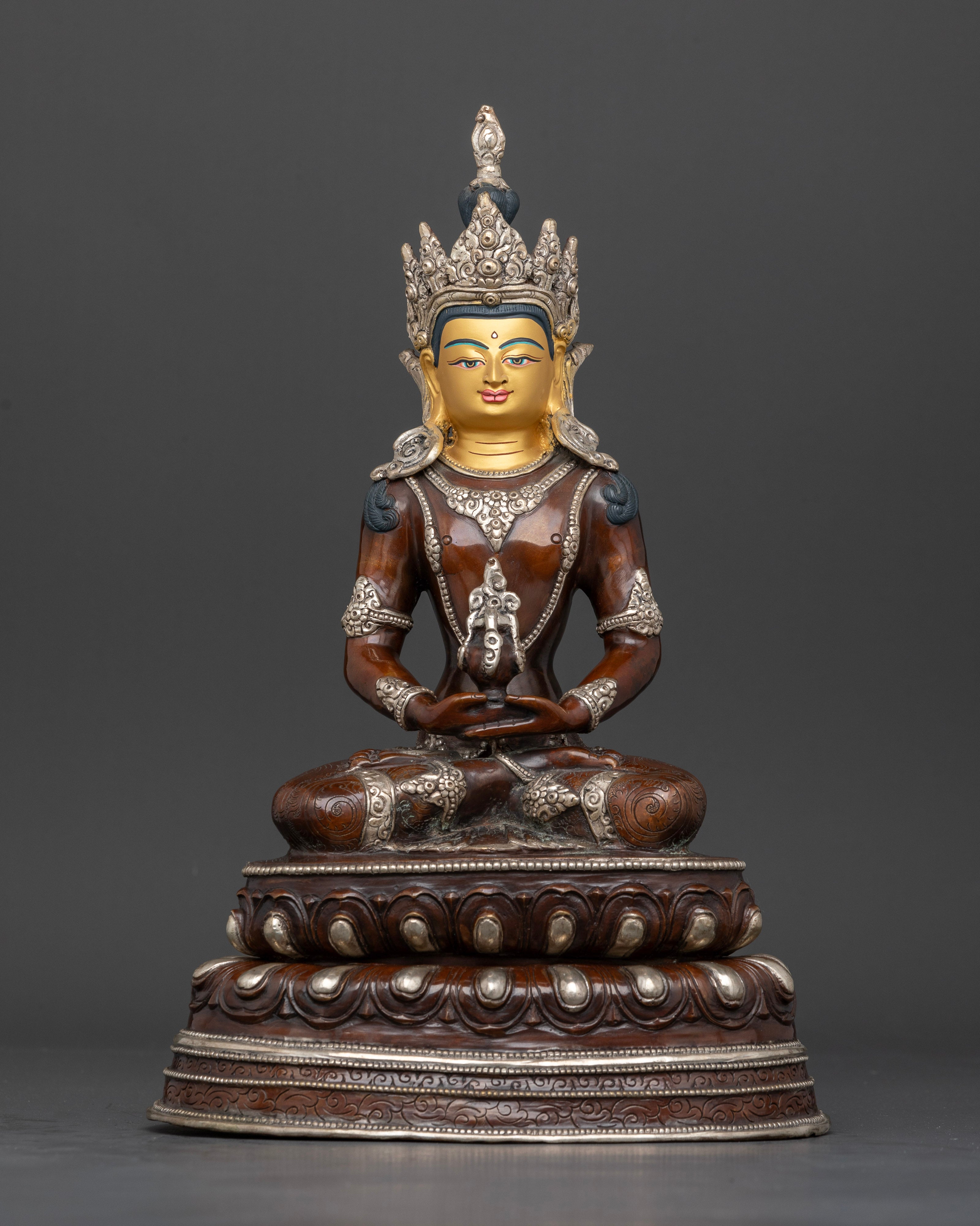 Amitayus statue, holding longevity vase with detailed Buddhist artwork