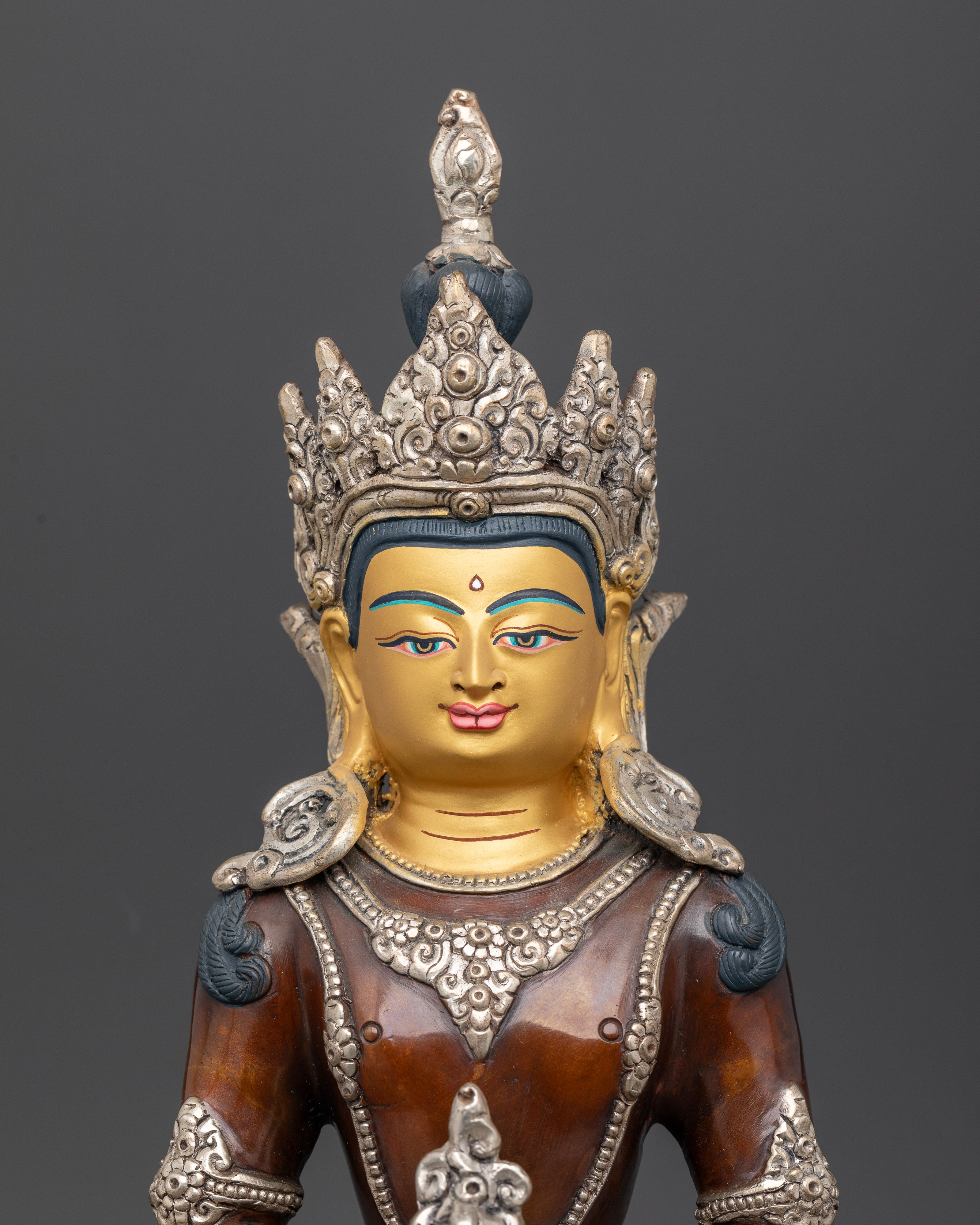 Amitayus statue with oxidized and silver plated finish and gold painted face