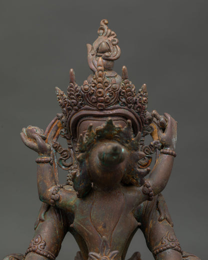 Amitayus with consort detailed face view with five jewel crown and layered necklaces.