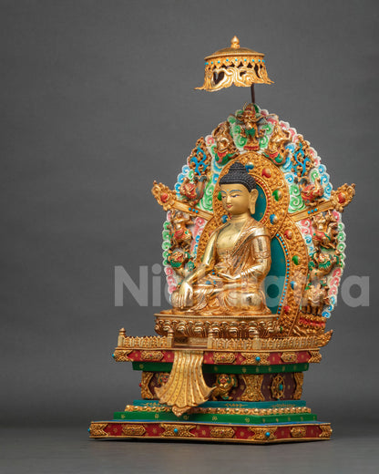 Angled side view of Shakyamuni Buddha statue with lotus pedestal and hand-carved throne base