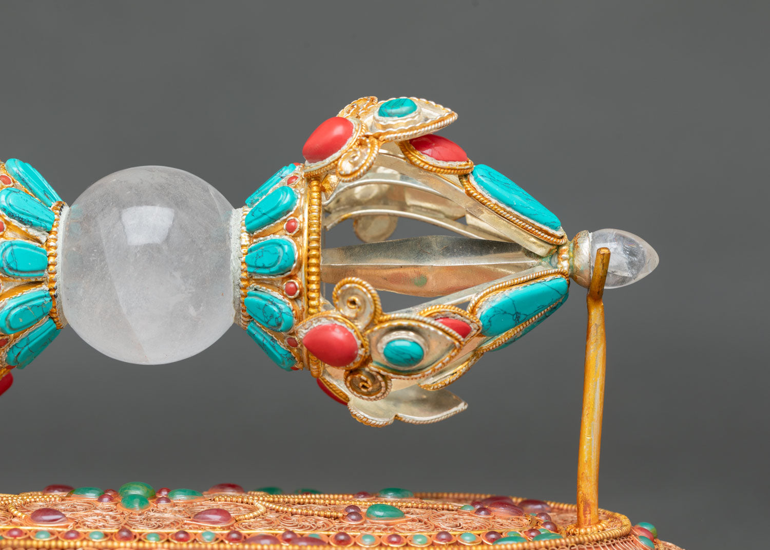 Angled View Buddhist Vajra Dorje With Stand Crystal Core And Semi Precious Stone Inlay Himalayan Art