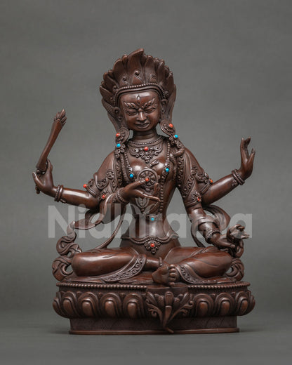 Apavadipramardani Tara statue holding a wheel, crusher of hostile forces, oxidized copper