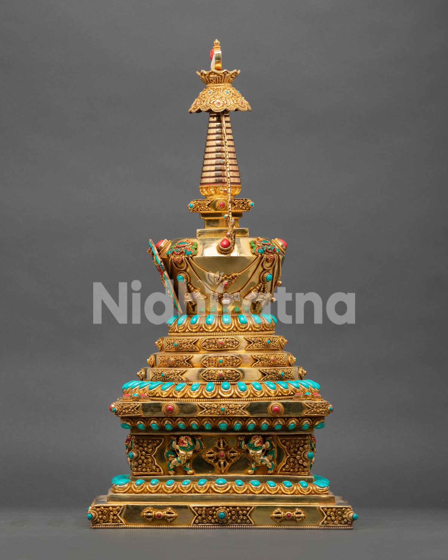 Authentic Buddhist Stupa from Patan, Nepal with gold-plated copper and decorative semi-precious stones