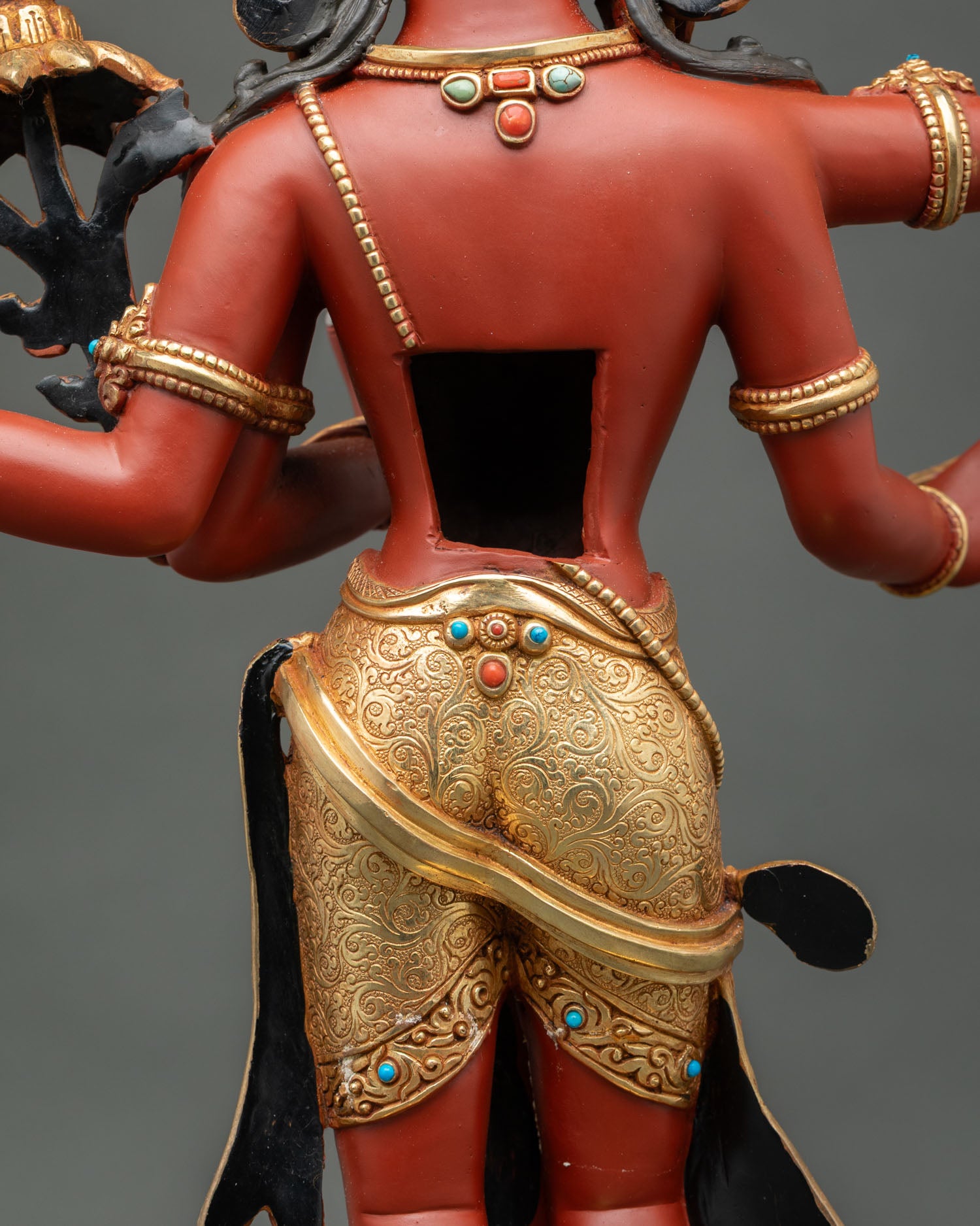 Back detail of gold ornaments and carving on Maha Manjushri statue