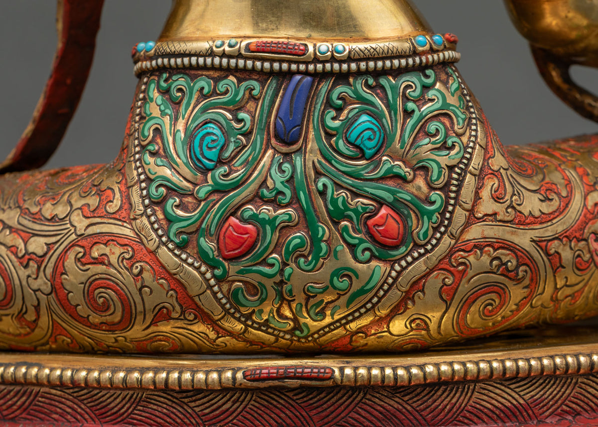 Back detail of Green Tara statue with gold-gilded finish and turquoise, coral and lapis stone inlays