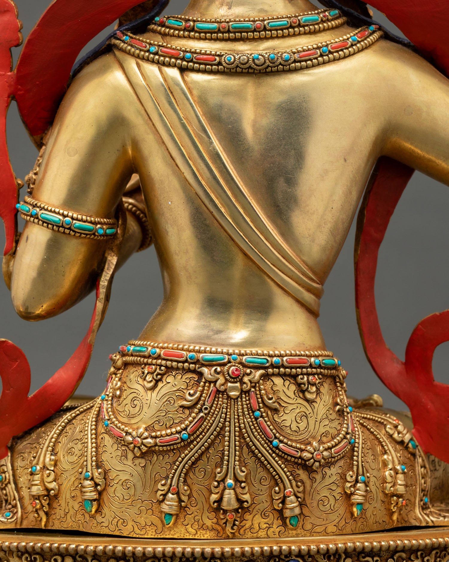Back detail of Manjushri Statue showing handcrafted robes and gold-gilded finish