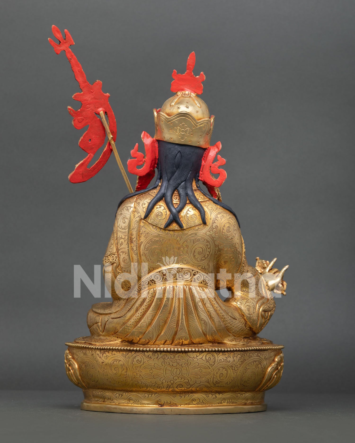Back of Guru Rinpoche Statue showcasing hand-carved robes and traditional Nepalese artistry