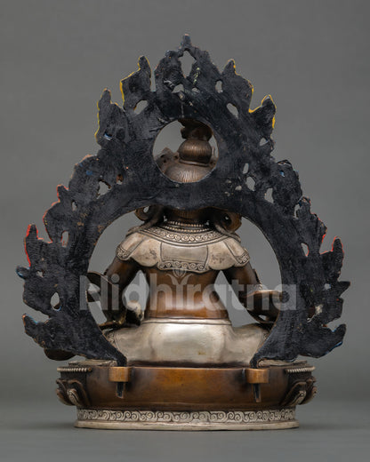 back view Dzambhala statue, detailed halo design and engraved sacred patterns