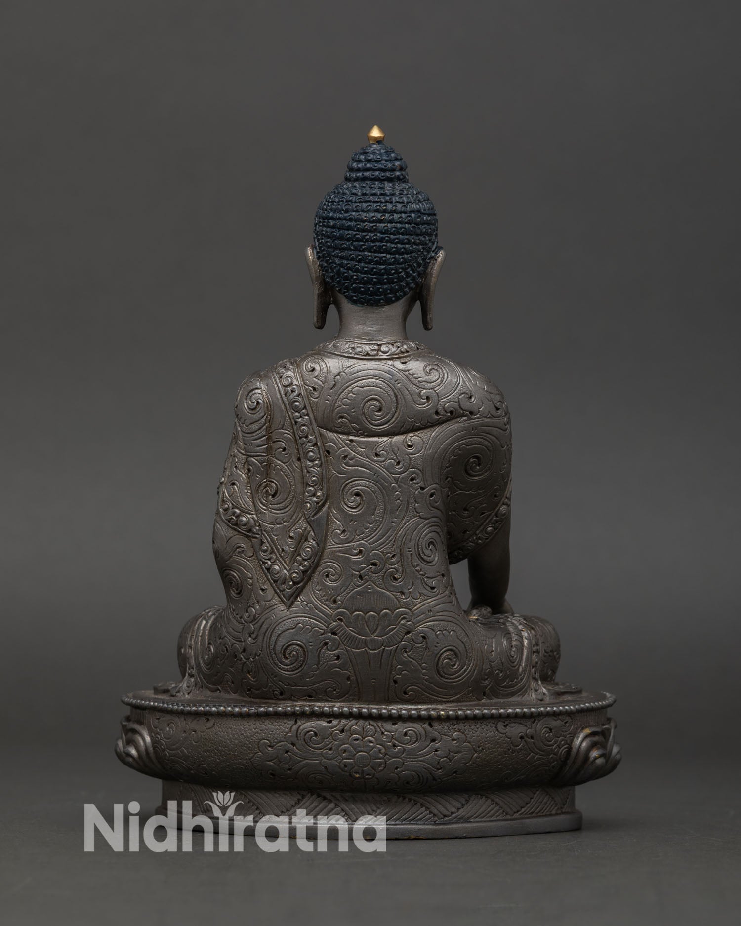 Back view of Akshobhya Buddha statue handcrafted Nepal lost wax copper sculpture, Dharma protector meditation altar art