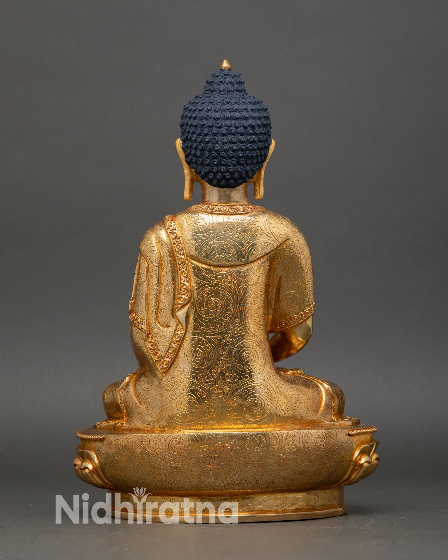 Back view of Amitabha Buddha with hand-engraved floral scroll motifs