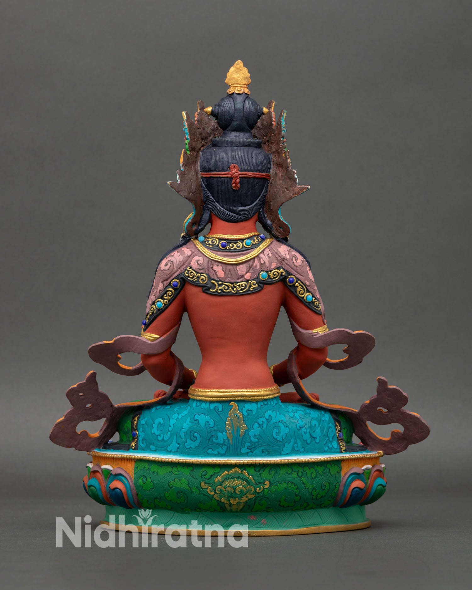 Back view of Amitayus statue showing copper craftsmanship with hand-painted finish and altar art