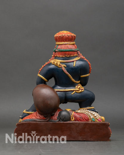 Back view Black Dzambhala sculpture Himalayan Buddhist deity protective guardian copper
