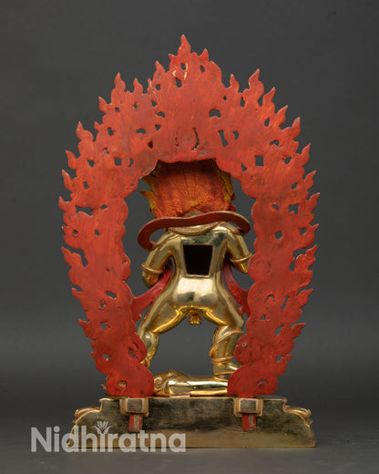 Back view of Black Dzambhala statue, Patan Nepal copper gold gilded altar decor wealth protector