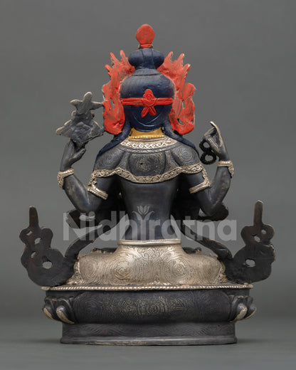 Back view of Chenrezig Buddhist statue from Nepal, sacred Himalayan devotional artwork and spiritual home decor.