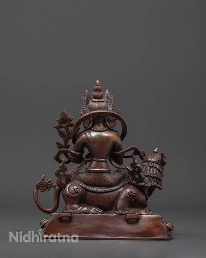 Back view of Chenrezig handcrafted statue detailed oxidized finish Kathmandu Valley Buddhist art piece