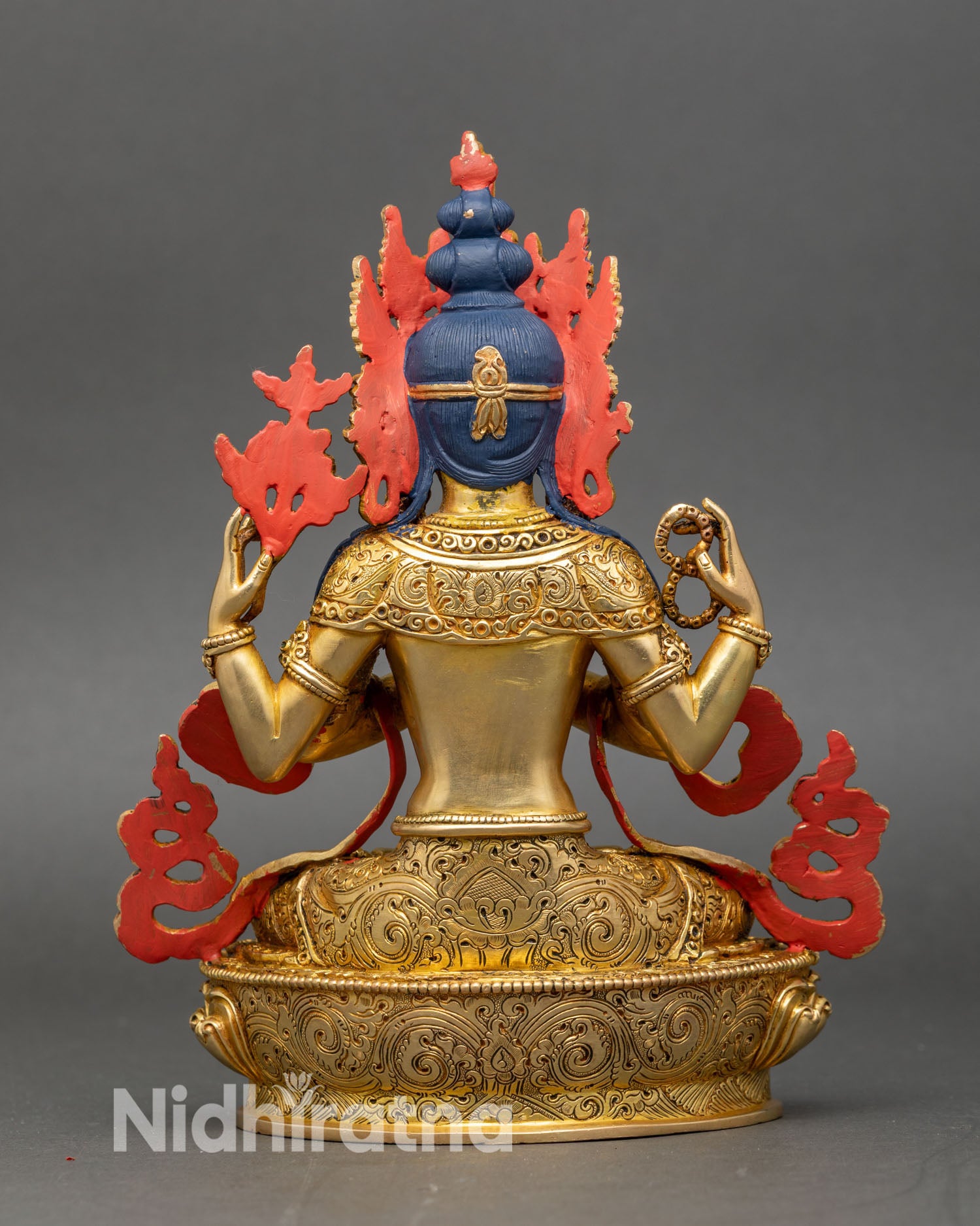 Back view of Chenrezig statue lotus seat floral details