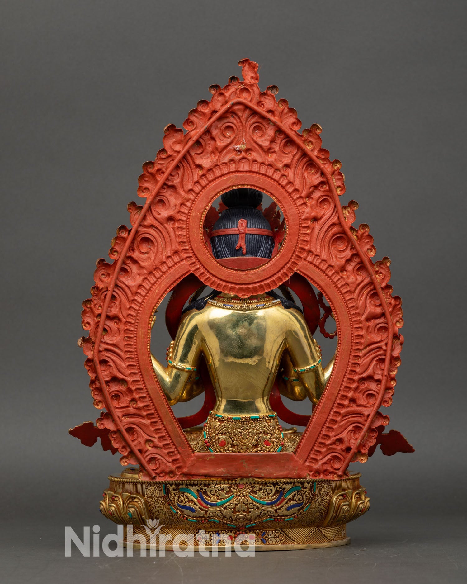 Back view Chenrezig statue ornate lotus throne and aureole halo