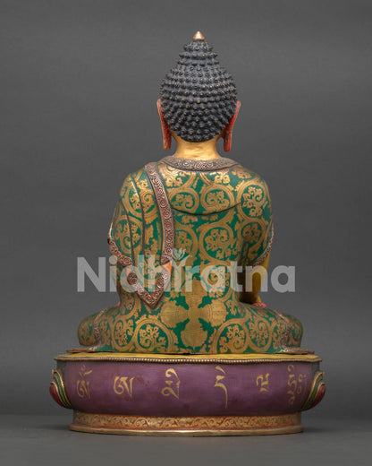 Back view of copper Buddha Shakyamuni statue showcasing traditional Newari craftsmanship