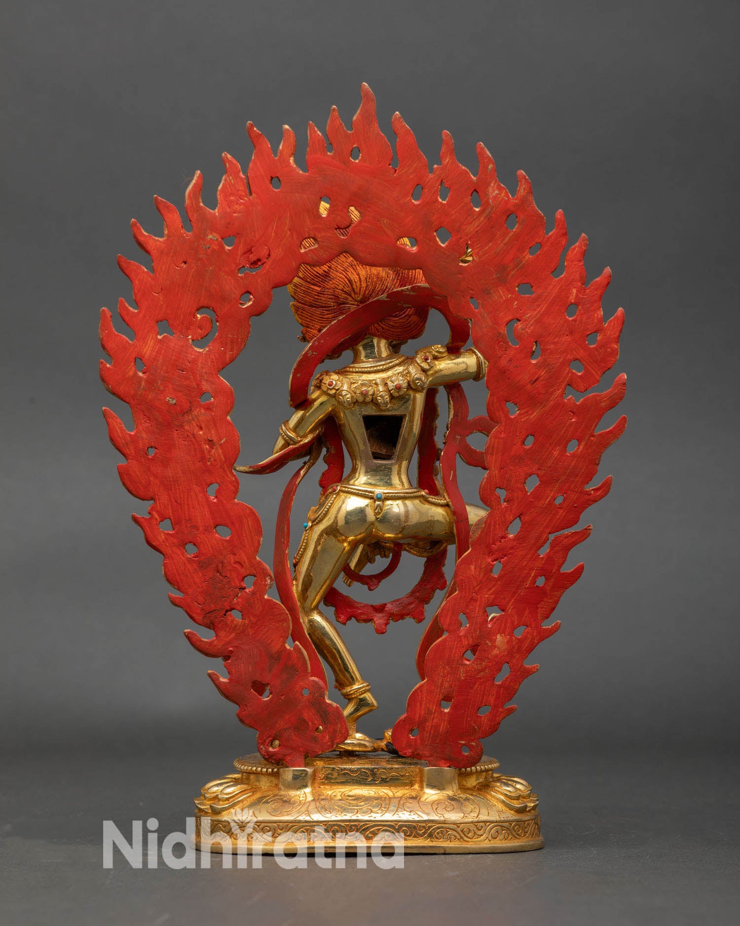 Back view of Dorje Phagmo statue, detailed robes, traditional Nepalese craftsmanship, sacred energy