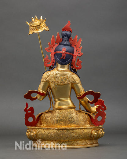 Back view Dukar Sitatapatra statue with intricate gold gilding and ornate jewelry details