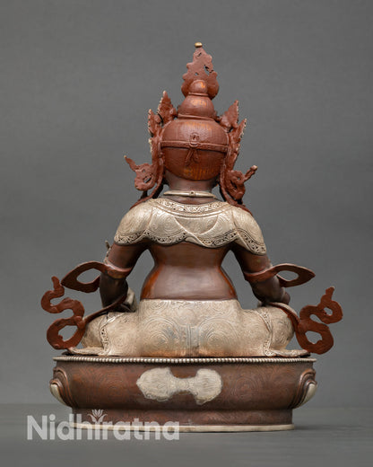Back view of Dzambhala sculpture detailed craftsmanship oxidized copper finish, Tibetan Buddhist wealth deity