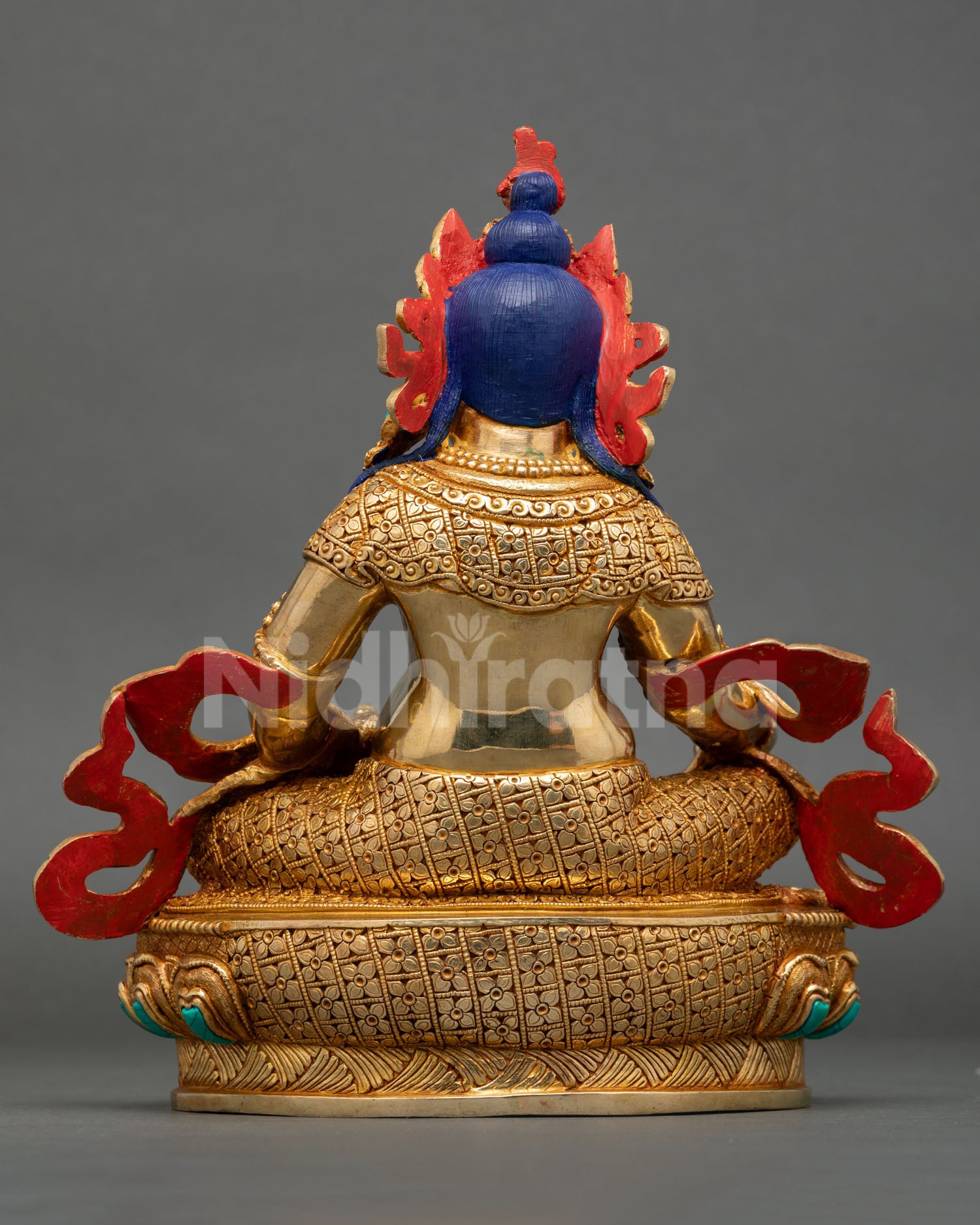 Back view of Dzambhala statue, copper 24K gold finish, intricate detailing, lotus base, traditional Newari Buddhist art 