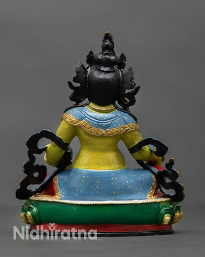 Back view of Dzambhala statue Nepal handcrafted artwork showing detailed lotus base copper casting finish