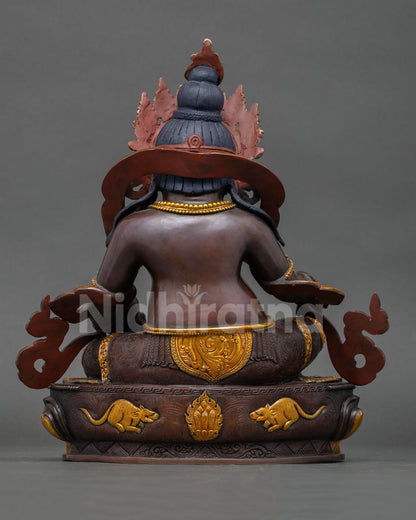 Back view Dzambhala statue Nepal handcrafted Buddhist art with detailed lotus throne carving