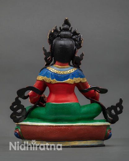 Back view of Dzambhala statue Nepal sacred artwork ornate lotus base handcrafted Buddhist wealth deity sculpture for spiritual decor