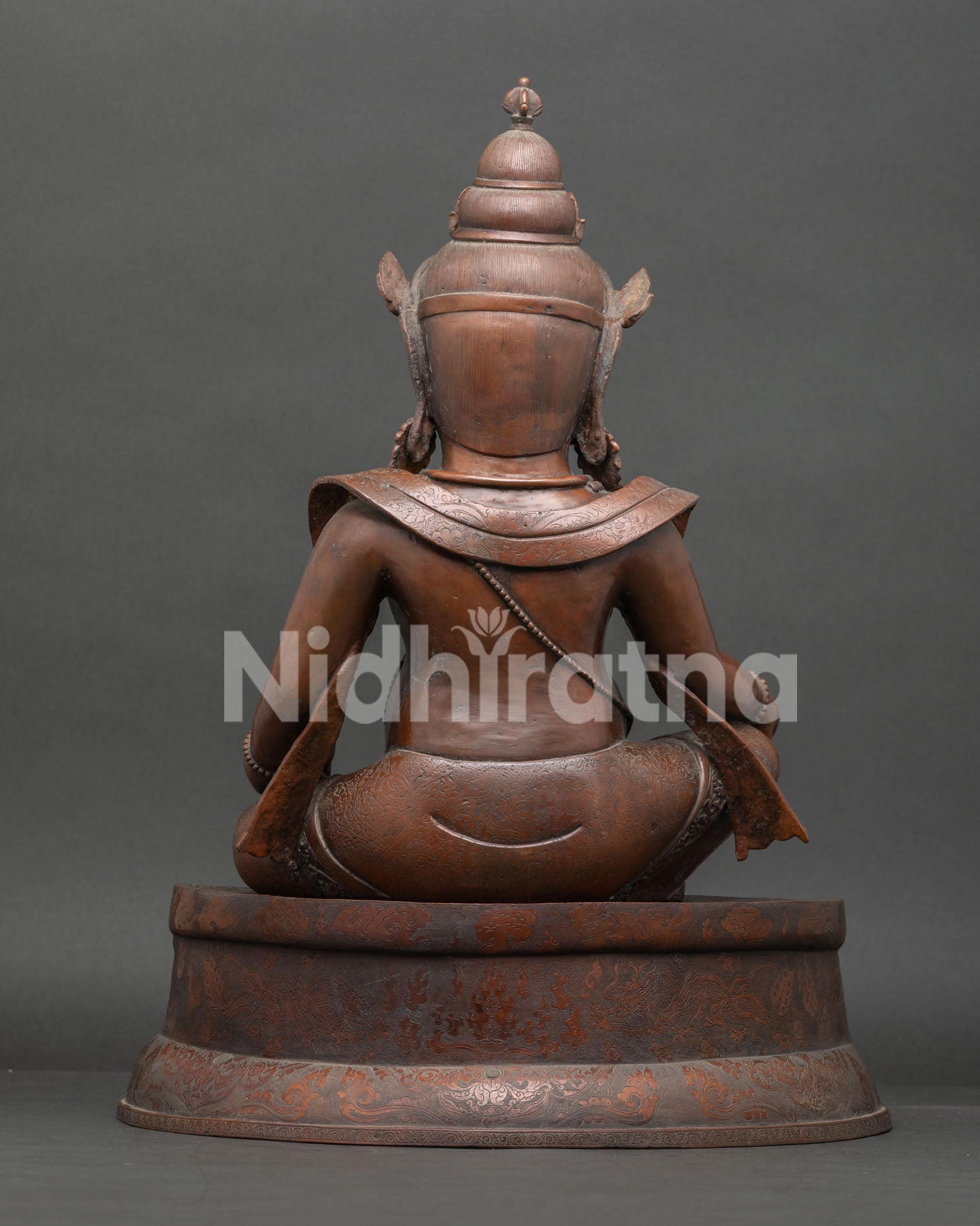 back view dzambhala statue oxidized copper detailing handcrafted buddhist sculpture nepal