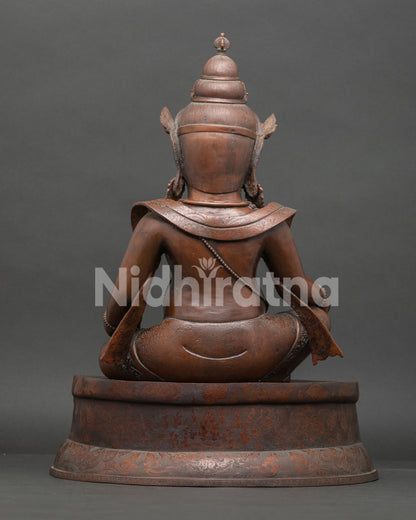 back view dzambhala statue oxidized copper detailing handcrafted buddhist sculpture nepal