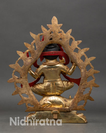 Back view Ganesh sculpture Hindu deity gold gilded copper sacred protective art