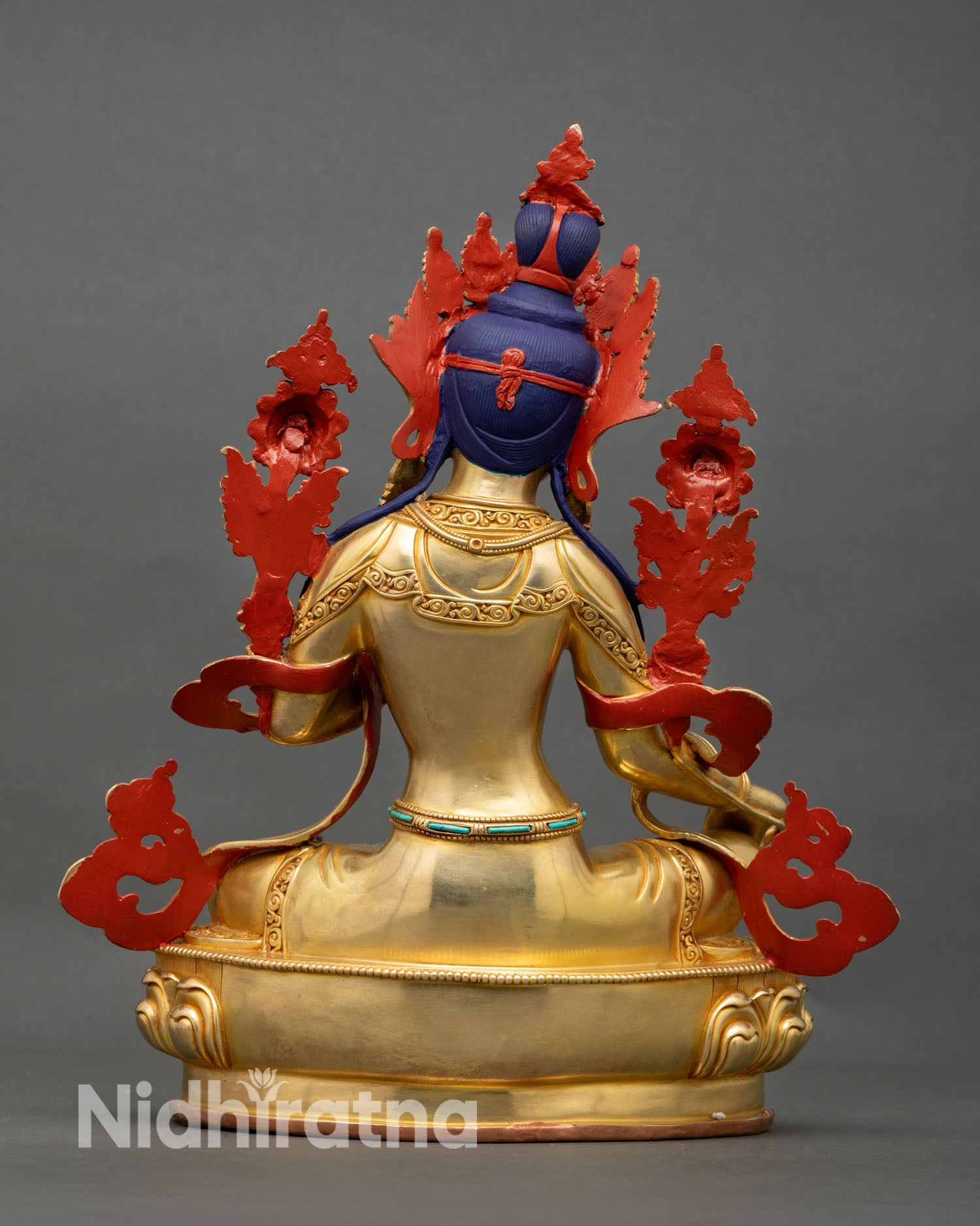 Back view of Green Tara statue Nepal handmade gold gilded copper artwork meditation altar spiritual decor and Buddhist deity sculpture