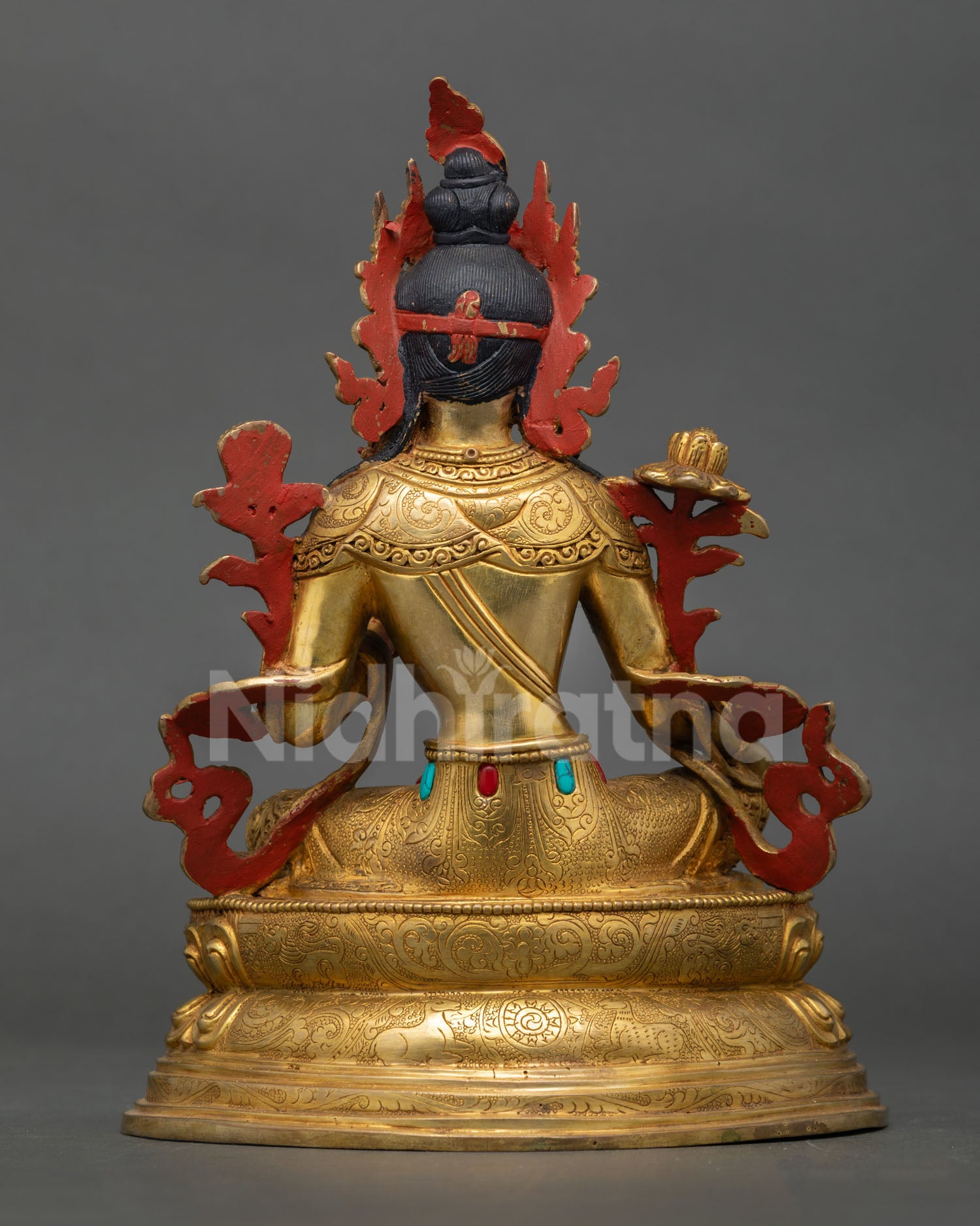 Back view of Green Tara Statue Nepal handmade sacred Buddhist goddess artwork gold detailing spiritual decor