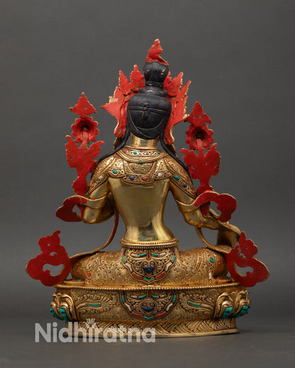 Back view of green tara statue radiant gold copper finish nepal buddhist art intricate jewelry details