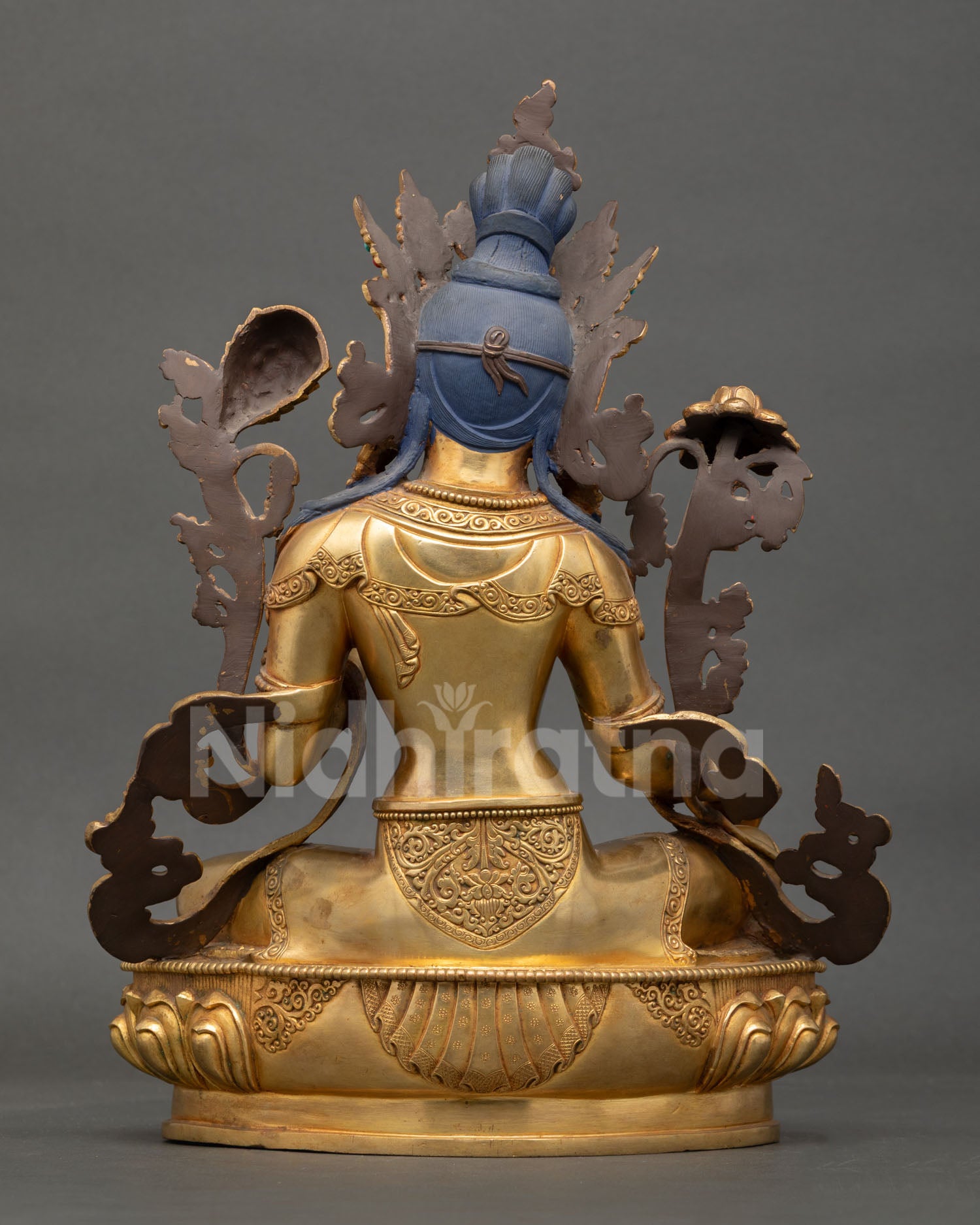 back view green tara statue showing engraved lotus base and detailed copper back design