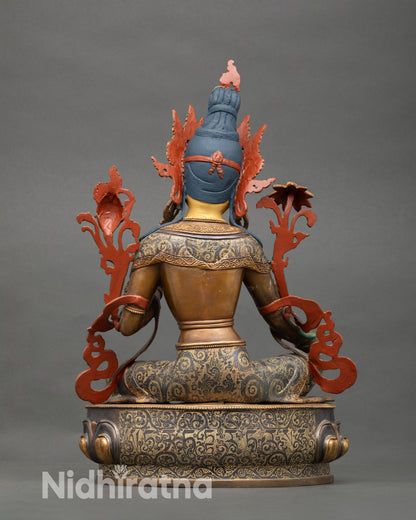 Back view of Green Tara statue showing gold accented lotus base and detailed robes Nepal handmade Buddhist sculpture