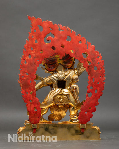 Back view of Guru Dragpo statue lotus base halo detailed carvings copper gold gilded Himalayan sculpture