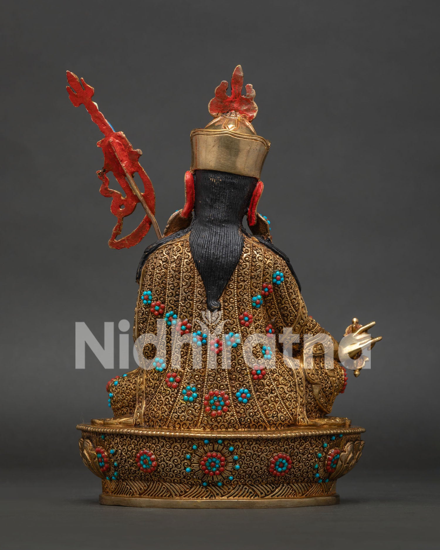 Back View Guru Rinpoche Copper Statue with Intricate Himalayan Carvings.