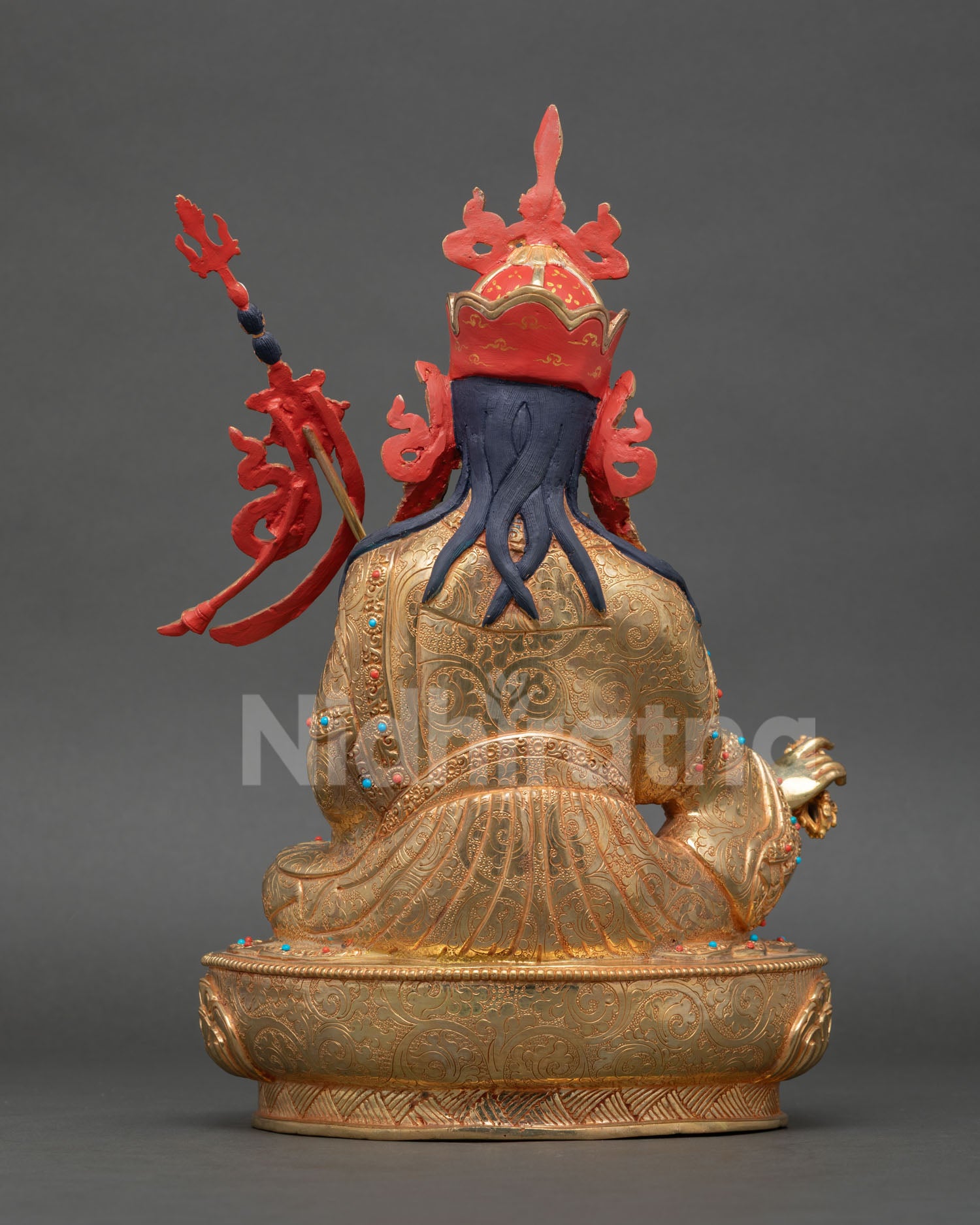 back view guru rinpoche statue detailed carving lotus seat sacred vajrayana ritual sculpture