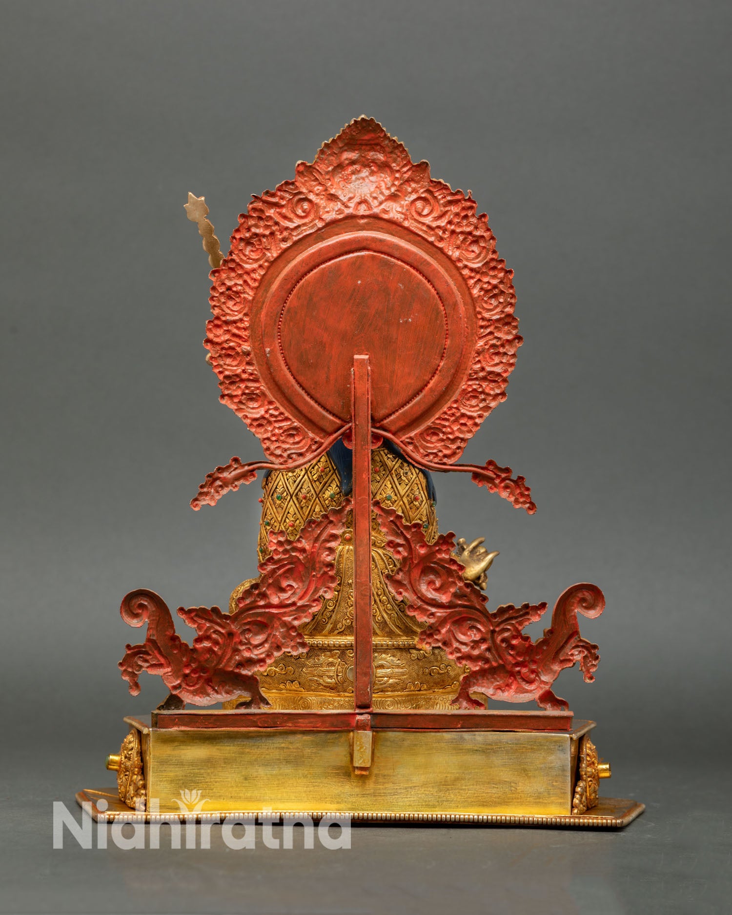 Back view of Guru Rinpoche statue handcrafted in Nepal using lost wax casting technique with a 24K gold finish.