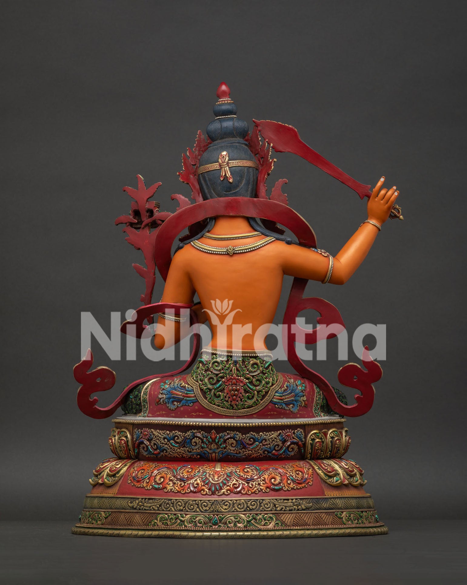 Back view hand painted Manjushri Buddhist copper statue ornate lotus base Newari Nepal craftsmanship