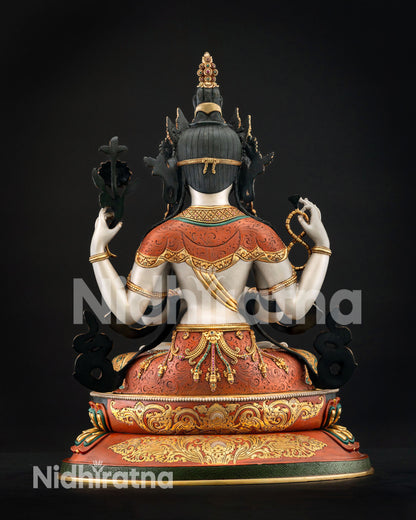 Back view handcrafted Chenrezig statue displaying detailed metalwork white body finish and traditional Himalayan artistry