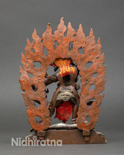 Back view of handcrafted Drogdze Wangmo statue from Patan Nepal oxidized copper sculpture silver plated details sacred Himalayan altar decor art
