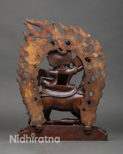 Back view of handcrafted Garwa Nagpo statue from Patan Nepal copper sculpture oxidized finish ritual artwork sacred Himalayan wrathful protector deity